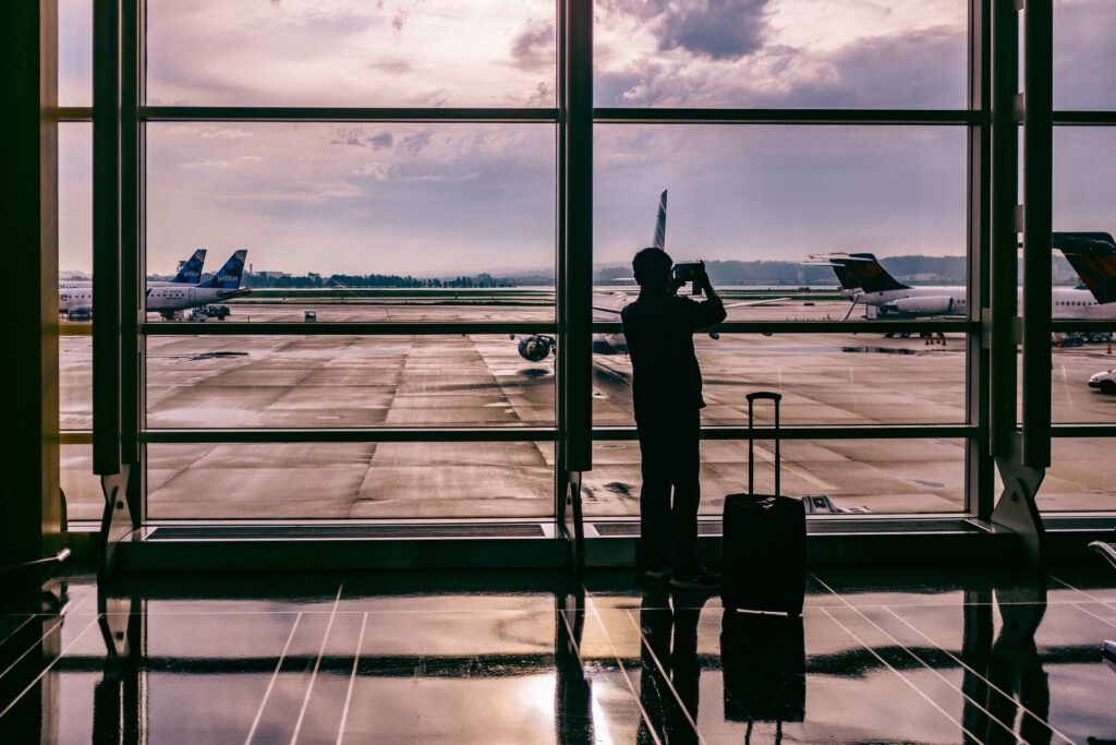 5399585-window-person-silhouette-airport-airplane-plane-sky-cloud-structure-luggage-suitcase-traveller-aeroplane-departure-travel-man-morning-flying-transportation-trip-creative-commons-images